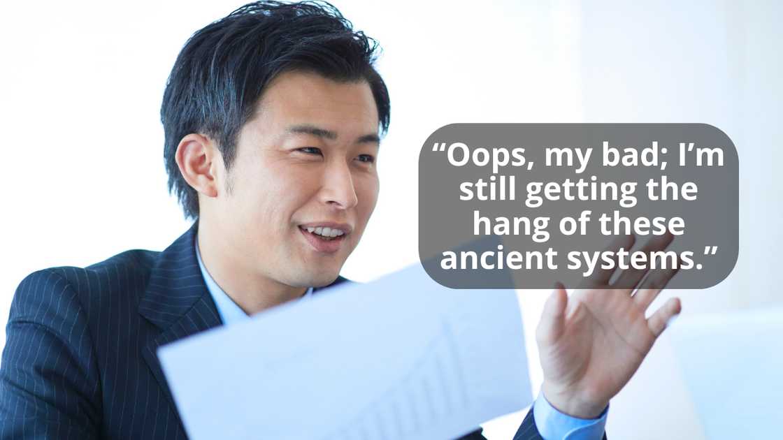 An accountant talking jokingly as he handles papers An accountant talking jokingly as he handles papers