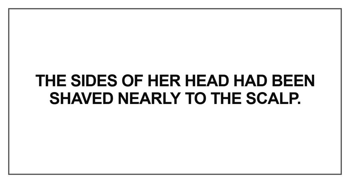 The sides of her head had been shaved nearly to the scalp