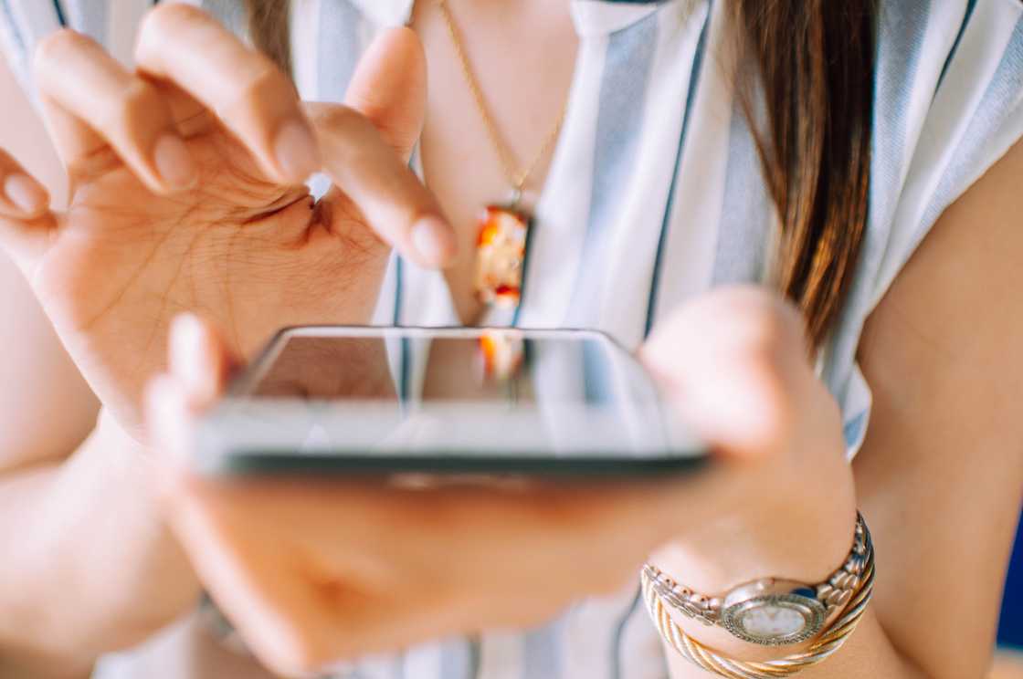 A lady using her phone