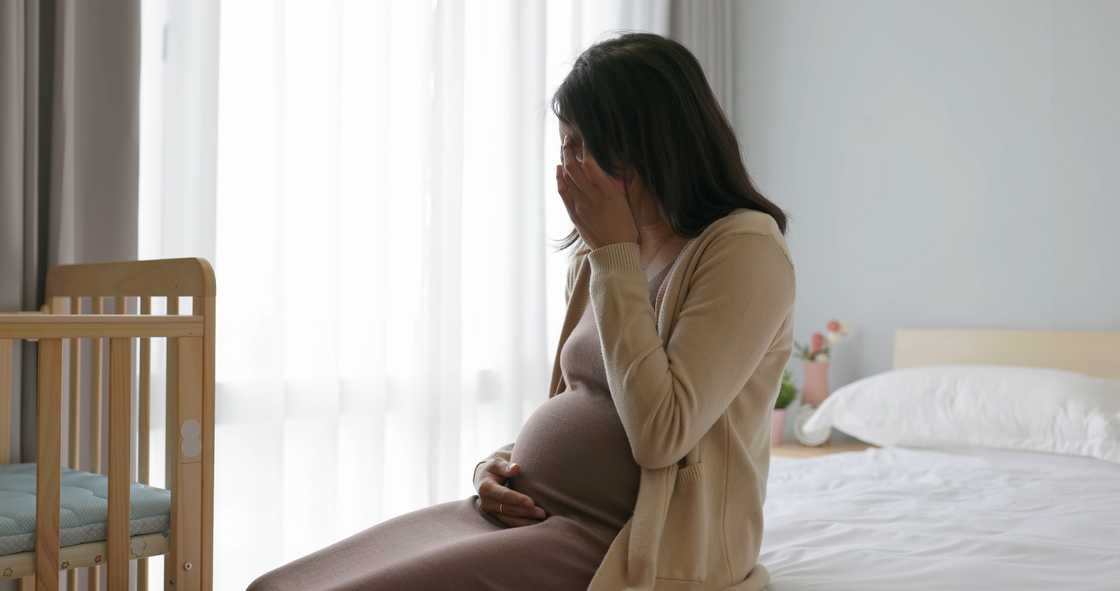 a stressed pregnant woman