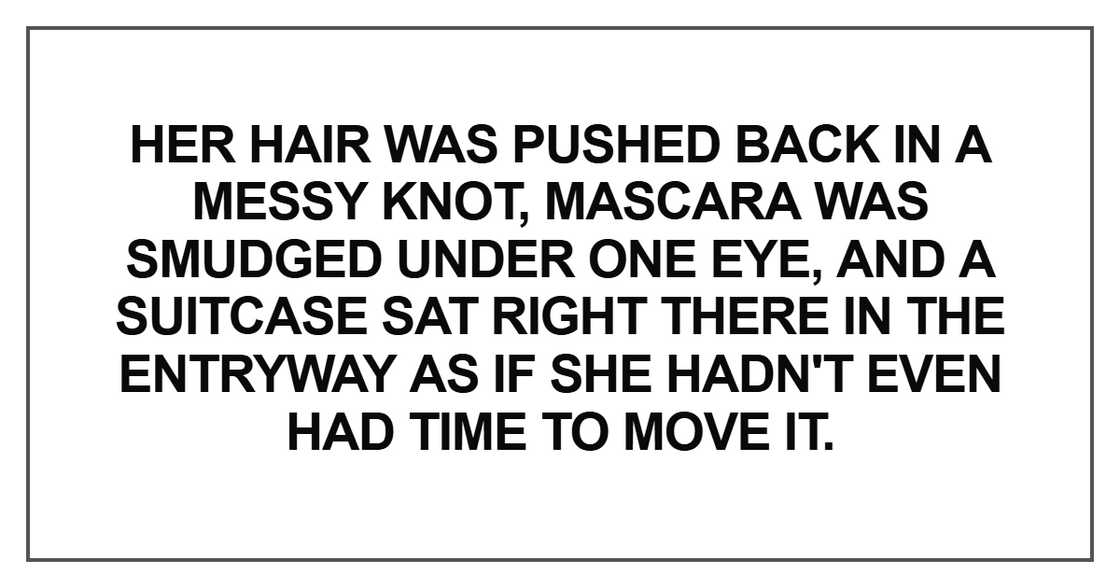 Her hair was pushed back in a messy knot