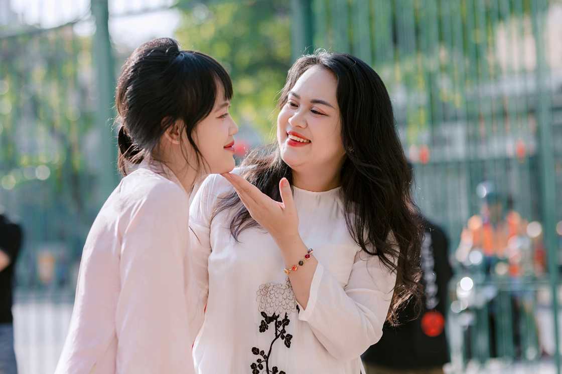 Two friends having a light conversation Two friends having a light conversation