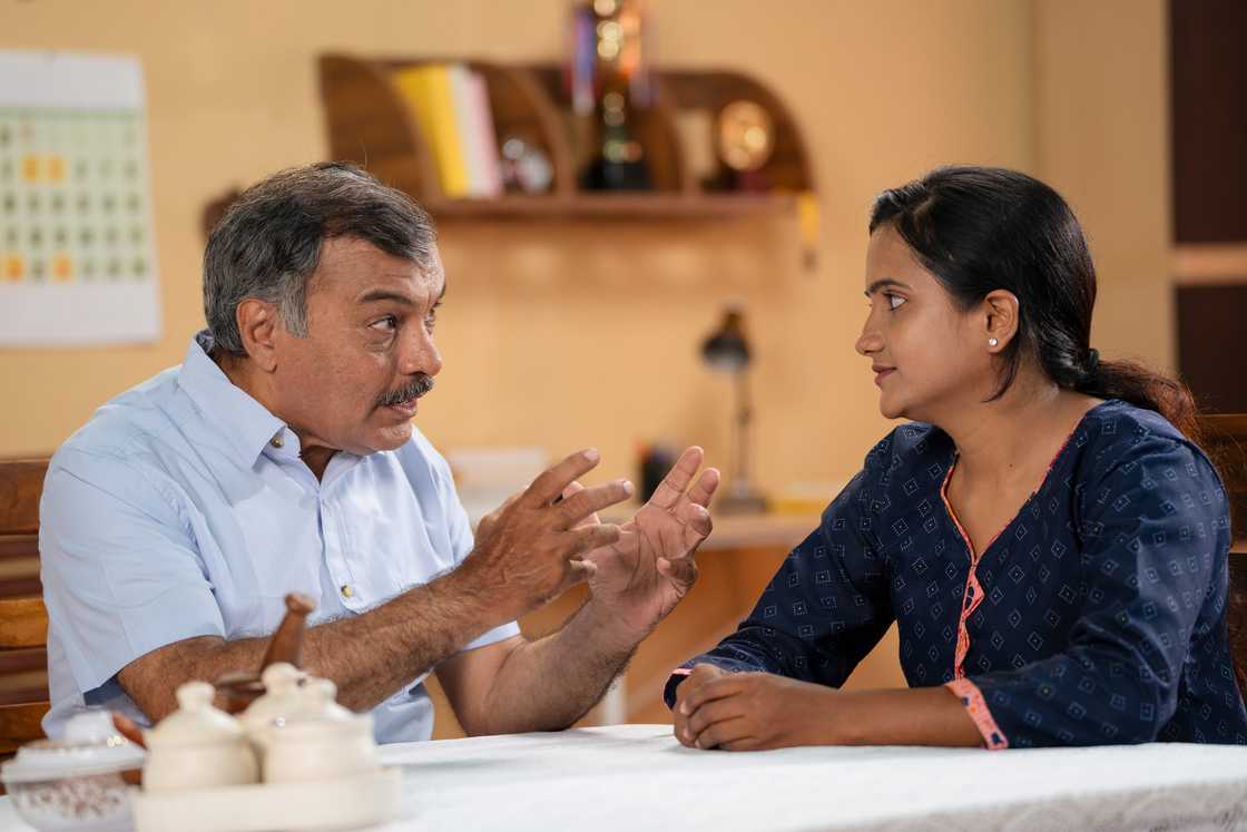 A lady and her uncle talking A lady and her uncle talking