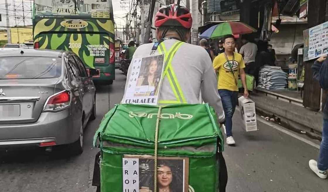 Grab rider na naka-flex ang Cum Laude na anak, viral sa social media Grab rider na naka-flex ang Cum Laude na anak, viral sa social media