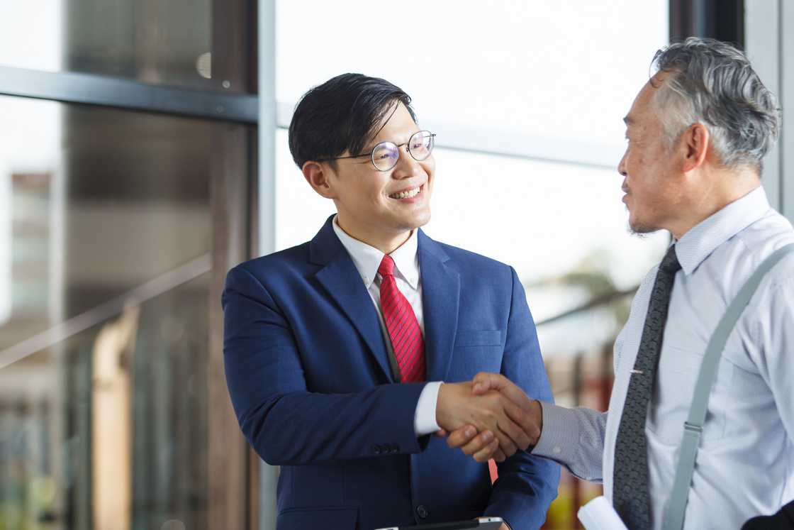 Businesspeople shaking hands Businesspeople shaking hands