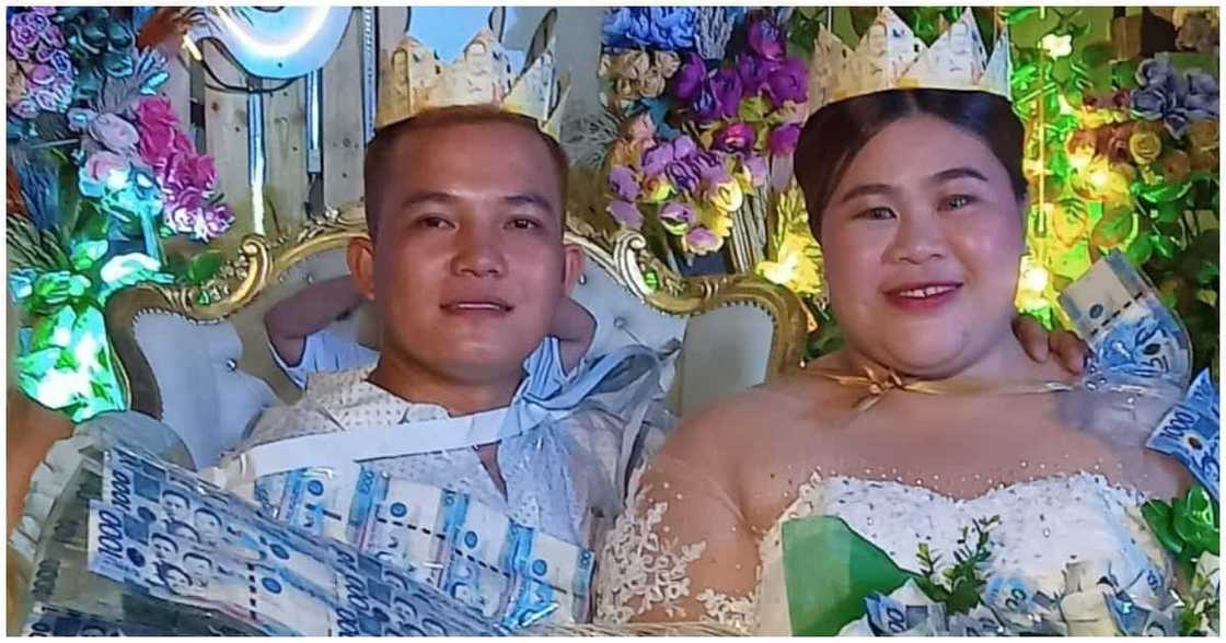 Bagong kasal, naging instant millionaire dahil sa kanilang money dance Bagong kasal, naging instant millionaire dahil sa kanilang money dance