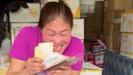 Whamos Cruz gives cash to his mother after seeing her expenses