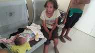 Photos of lola caring for her sick grandson at hospital break netizens' hearts