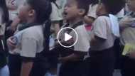 Cute young Pinoy captured singing PH national anthem with funny facial expressions