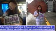 Galing maghanap! Future dentists walk under the rain from CEU to G. Tuazon wearing placards offering ‘libre bunot, linis, pasta at pustiso’