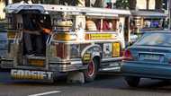 Photo of jewelry-laden woman riding jeepney holding wads of cash goes viral