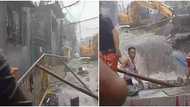 Lalaki sumuong sa baha upang sagipin ang bata sa Quezon City