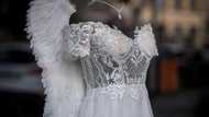 My dad sewed me a dress from my late mom’s wedding gown–My tutor laughed until an officer walked in