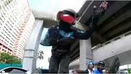 Rider seen dancing on top of motorcycle gets his license suspended
