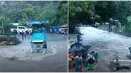 Mga residente, nagtulungan sa pag‑ahon ng jeep mula sa baha sa Batangas