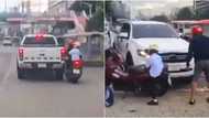 Pickup truck tries escaping after hitting a father-son riding a motorcycle
