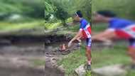 Masskara cyclist na pinainom ng maruming tubig mula sa sapang may kalabaw, umalma