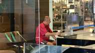 Loyal man patiently waits for wife at coffee shop for Valentine's Day