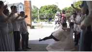 Groom, literal na "na-fall" sa kanyang bride sa sana'y dip kiss photoshoot nila