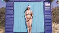 Anne Curtis proudly shows off 30-week baby bump in bikini