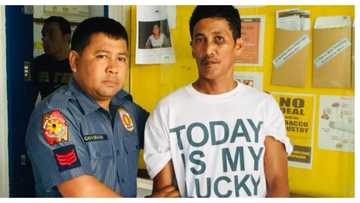 Larawan ng pulis at lalaking agaw pansin ang suot na t-shirt, viral
