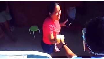 Video ng feeding program na inakalang nanghuhuli ng walang face mask at shield, viral