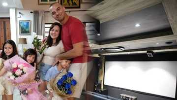 Doug Kramer shows off their luxurious home cinema in their new mansion