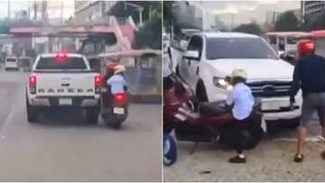 Pickup truck tries escaping after hitting a father-son riding a motorcycle