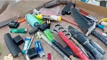 Knives, machetes, and other contrabands confiscated from 50 students in Iloilo