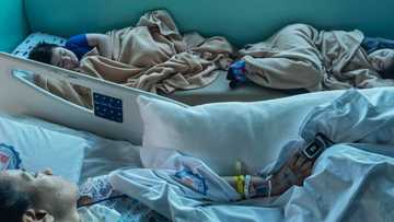 Andrew Schimmer shares photo of wife in hospital with their children