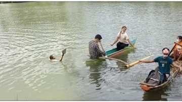 Viral na buwis-buhay na paglangoy ng teacher sa ilog, usap-usapan