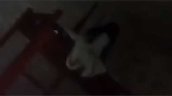 Alleged white lady, caught on camera inside a boarding house