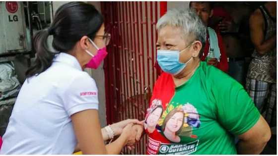 Larawan ni Tricia Robredo na nakipag-kamay sa BBM supporter, viral