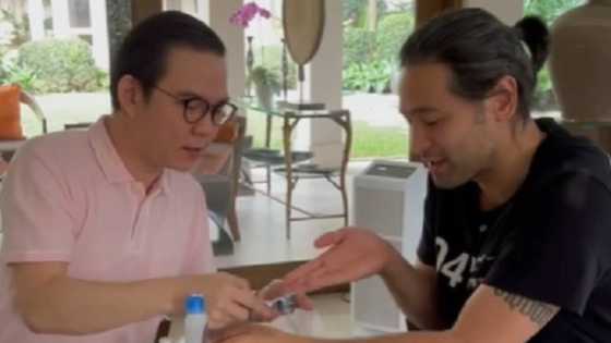 Liza Soberano assists Hayden Kho during treatment of his painful wrist condition