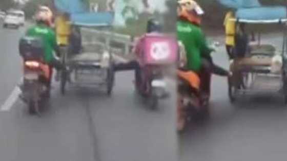 Two riders used their legs "literally" to push lolo's trisikad on uphill road