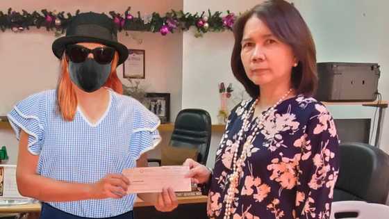 PCSO, iginiit na sinadya nilang in-edit ang damit ng Lotto jackpot winner