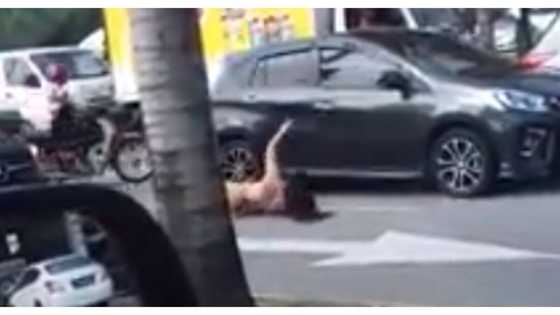 Babaeng walang saplot na nanggugulo sa mga sasakyan sa kalsada, sapul sa video