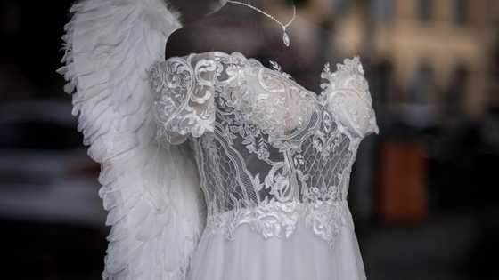 My dad sewed me a dress from my late mom’s wedding gown–My tutor laughed until an officer walked in