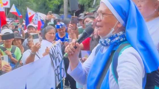 Madre sa anti-corruption rally, dinuro at minura matapos sabihing mahalin si PBBM