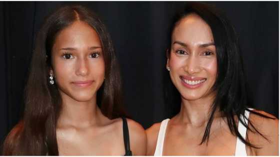 Ina Raymundo congratulates daughter Anika as she graduates from middle school