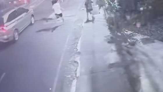 CCTV captures youths in stone-throwing chase along Lacson Avenue