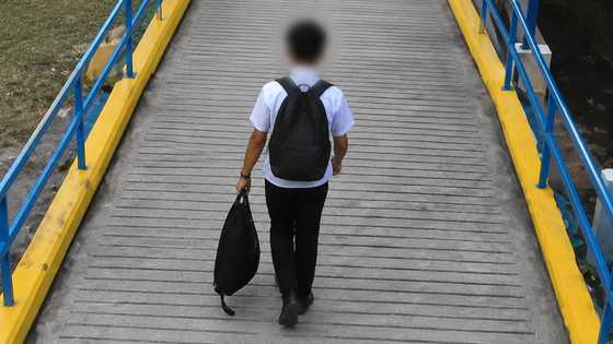 Grade 8 student in Ateneo de Zamboanga shooting seen carrying long black bag in CCTV