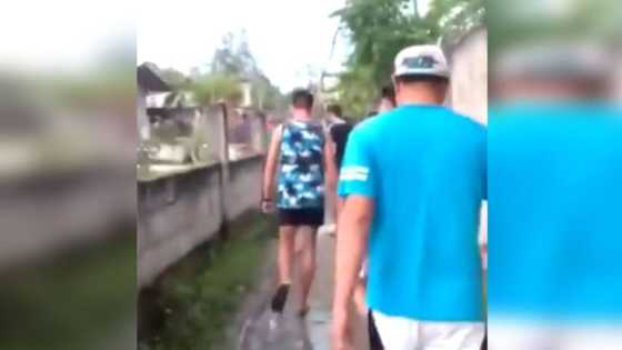 Video of men gathering outside home of Jonel Nuezca after shooting Gregorio surfaces