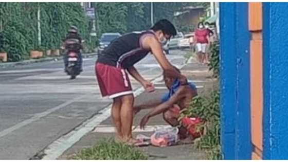 Mag-asawang binihisan at pinakain ang isang lalaking palaboy, hinangaan ng marami