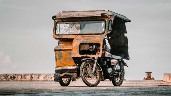 Man wearing only underwear seen dancing on top of a moving tricycle explains reason behind actions