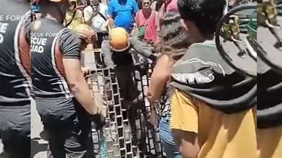 Man rescued from drainage in Cebu City after searching for coins