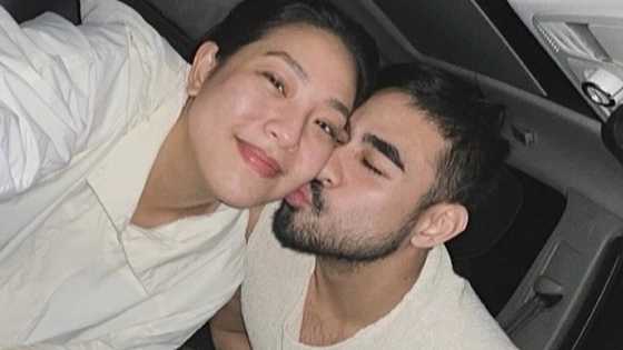 Rita Daniela and Mclaude Guadaña write sweet notes for one another in series of photos