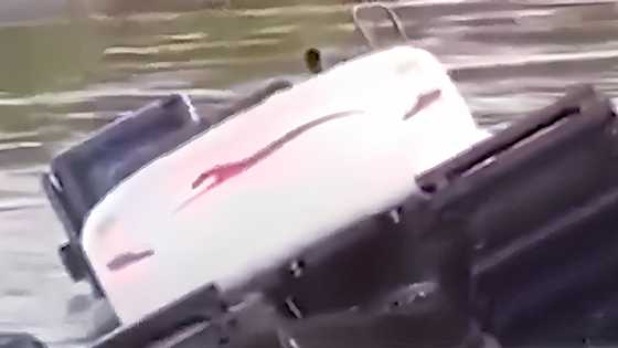 Soft soil causes amphibious backhoe to capsize in a river in Negros Occidental, killing the operator