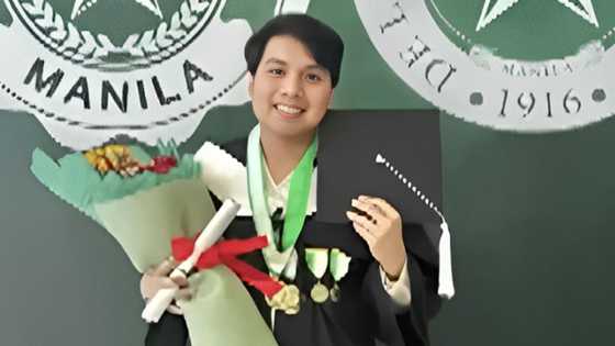 Student with autism graduates summa cumlaude from De La Salle University